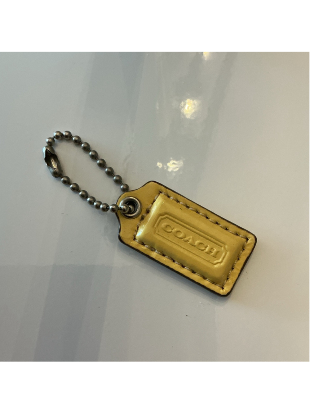 Coach Small Yellow Bag Tag